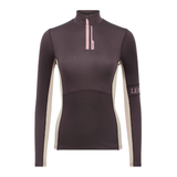 LeMieux AW26 Matilda Mid Layer Variant Colour Cocoa.
A women's long-sleeve quarter-zip athletic top with light beige side panels and a light pink zipper pull, shown on a plain white background.