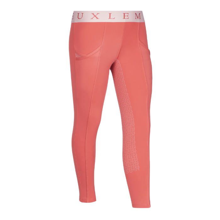 LeMieux AW26 Mini Pull Ons Varient Spiced earth. A pair of coral pink athletic leggings with a white waistband featuring the brand name 'LeMieux' in pink lettering. The leggings have a subtle tonal pattern on the inner thigh and side pockets, shown against a plain white background.