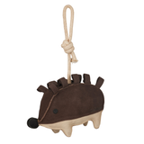 Hedgehog-shaped toy with a rope on a white background