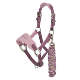 Dark pink pony headcollar with soft pink fleece nose strap and matching lead rope on a white background