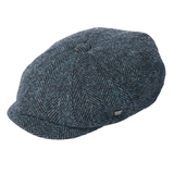 Blue tweed cap on a white background
