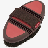 Red and brown horse brush on a white background