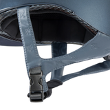 Close-up of a blue helmet with a strap on a white background