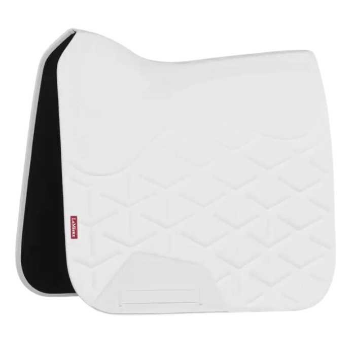 White dressage saddle pad with a textured surface on a white background