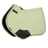 Yellow jumping cut saddle pad on a white background