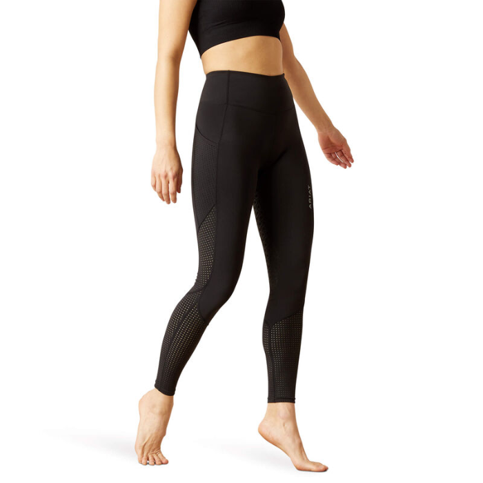 Black leggings worn by a person on a white background