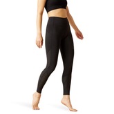 Black leggings worn by a person on a white background