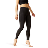 Black leggings worn by a person on a white background