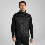 Man wearing a black long sleeve top and gilet with black breeches on a grey background