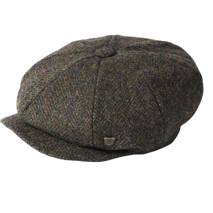 Green tweed cap on a white background