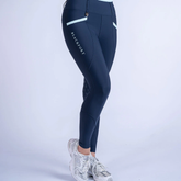 Navy leggings with pale blue accents and 'Blackfort' branding on a light grey background