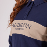 Navy and beige polo shirt with 'Aubrion Equestrian' text on a plain background