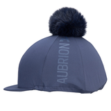 Blue riding hat with a fur pom-pom on a white background