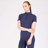 Woman wearing a navy athletic outfit on a white background