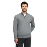 LeMieux AW26 Mens Quarter Zip Knit Varient Grey. A man wearing a heather gray quarter-zip pullover sweater with a small brown zipper pull, paired with dark jeans, against a plain white background.
