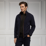Holland Cooper Country Fleece Jacket (Men's) Variant Navy. Man wearing a long sleeve navy fleece jacket with brown leather trim detailing against a white background. 