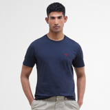 Man wearing a navy blue t-shirt with a red Barbour logo on a white background