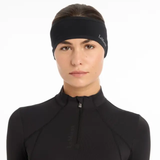 LeMieux AW26 Ear Warmer Headband Variant Colour Black.
A woman in profile wearing a black athletic headband with the brand name 'LeMieux' printed in white on the side, paired with a black athletic top against a plain white background.