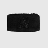 Black knit headband with a logo on a light grey background