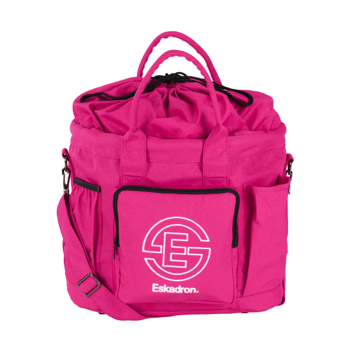 Pink horse grooming bag with two handles and a white Eskadron label against a white background. 