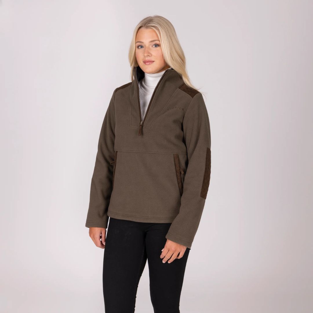 Woman wearing a brown pullover with a white background