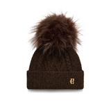 Holland Cooper Sloane Cable Bobble Hat Variant Chocolate. A dark brown cable-knit beanie with a large matching faux fur pom-pom and a small gold embroidered 'H' logo on the front cuff, shown against a plain white background.