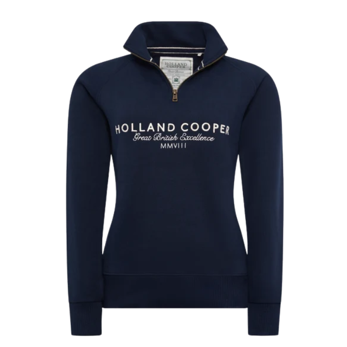 Holland Cooper Sporting Goods Zip Henley - Ink Navy. A navy blue long-sleeve quarter-zip sweatshirt with 'HOLLAND COOPER Free British Excellence MMVIII' printed in white on the chest, shown on a plain white background.