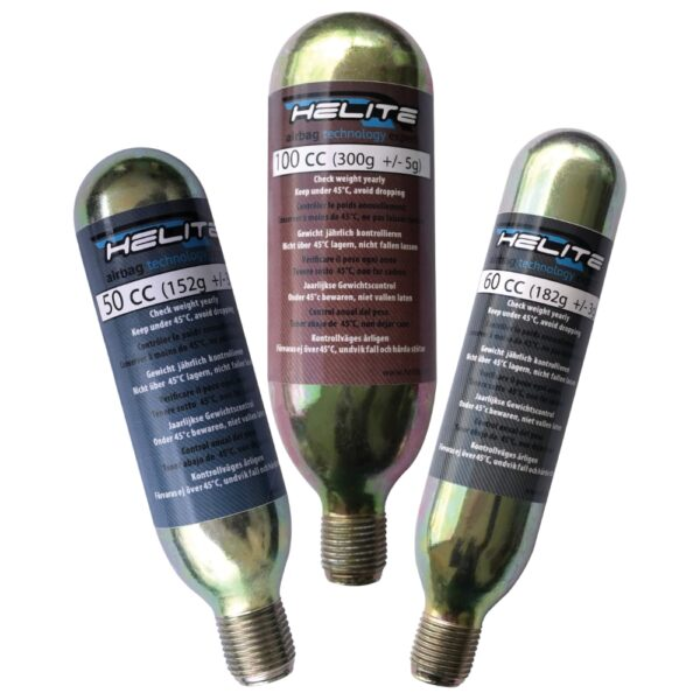 Three Helite CO2 canisters on a white background