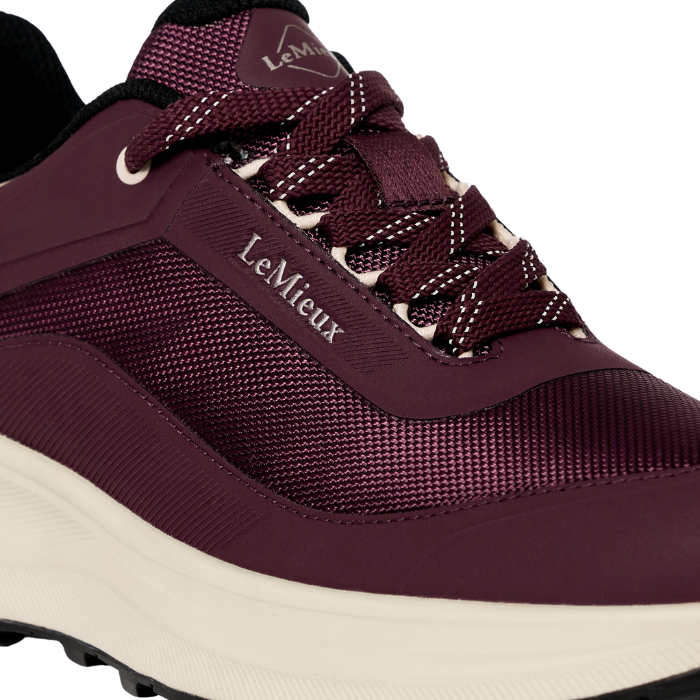 LeMieux AW26 Kanta Waterproof Trainers Variant Colour Bramble. 
A close up of a trainer in bramble colour with beige trim and 'LeMieux' brand name on white background.