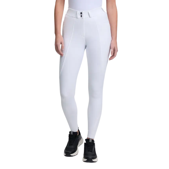 White riding pants worn by a person on a white background