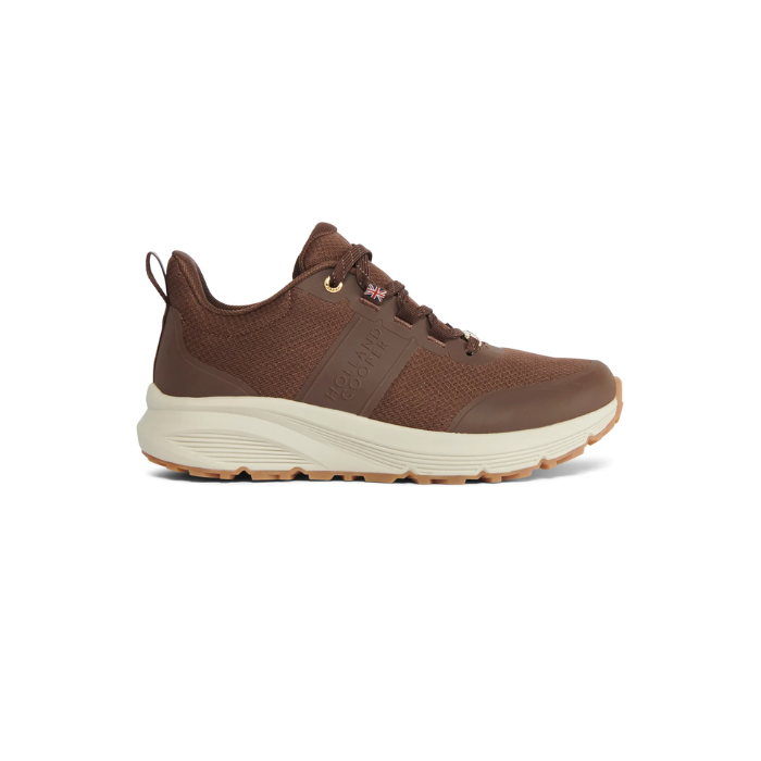 A brown mesh and synthetic athletic shoe with a thick off-white midsole and a small Union Jack detail on the side, shown from a side profile against a white background.