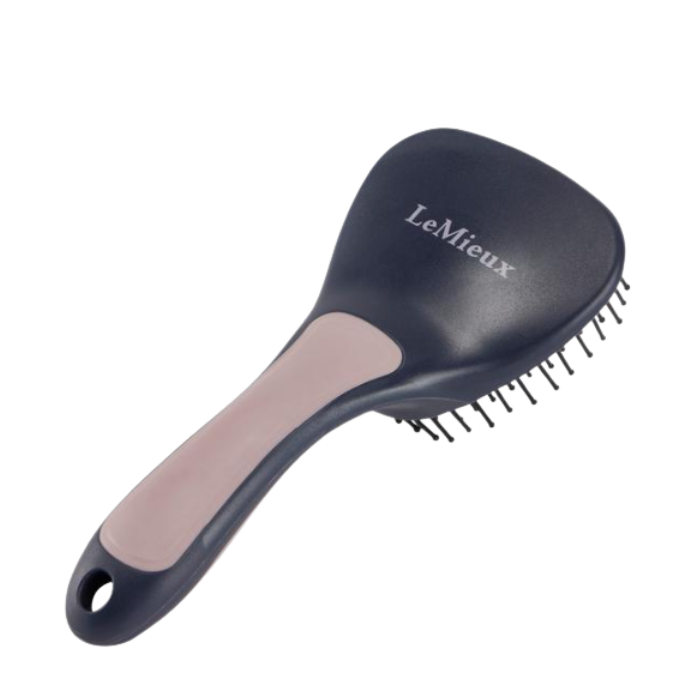 LeMieux AW26 Tail Brush Varient Navy. A LeMieux brush with a dark navy blue plastic head and a light pinkish-beige handle grip, shown on a plain white background.