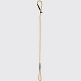  Gold rope dog lead with brown leather detailing on a white background. 