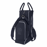 A dark navy blue boot/ hat bag with white piping and a gray circular logo on the front pocket, featuring dual top handles and shoulder straps, shown against a plain white background.