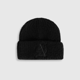 Black knit beanie with a logo on a light grey background