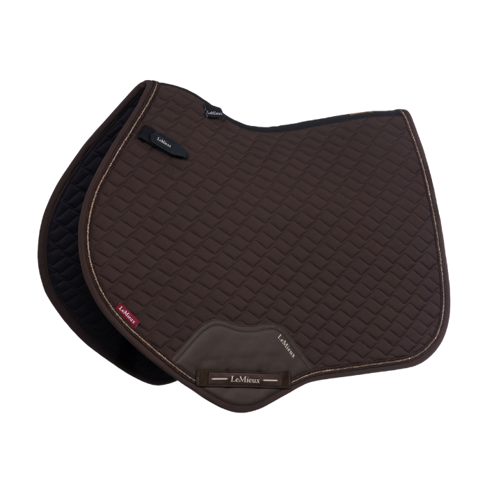 Brown saddle pad on white background