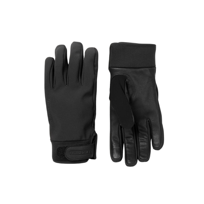 Pair of black gloves on a white background