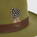 Dubarry Gallagher Hat Variant Olive. Close-up of an olive green felt hat with a brown leather band and a black-and-white spotted feather accent, shown against a light neutral background.