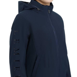 LeMieux AW26 Young Rider Team Jacket Variant Colour Navy. A close up of a model wearing a navy jacket on white background. 