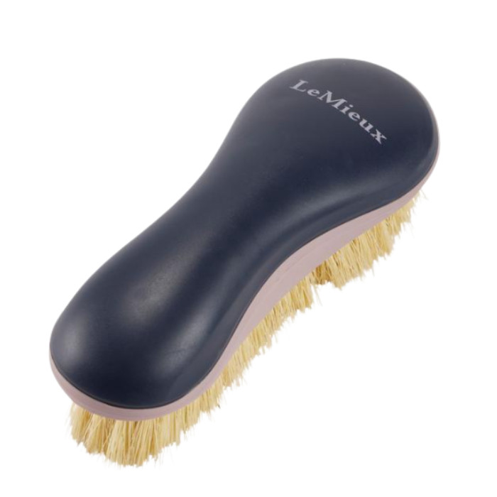 LeMieux AW26 Body Brush Varient Navy. LeMieux brush with a dark navy blue ergonomic handle, natural beige bristles, and a light pink inner trim, shown on a white background.