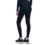 Person wearing black athletic leggings on a white background
