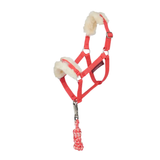 Red horse halter with white fleece padding and pink rope on a white background