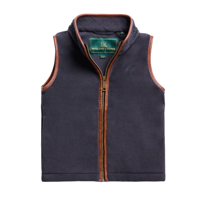 Holland Cooper Little Country Fleece Gilet Varient Ink Navy. Mini fleece gilet with bworn leather trim detailing and a brown/gold zip on a white background.