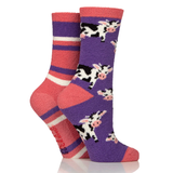 Two pairs of socks with cow patterns on a white background