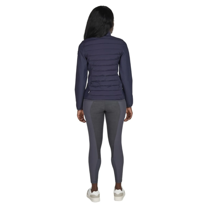 Person with navy jacket and grey leggins on white background
