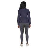Person with navy jacket and grey leggins on white background
