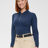 Woman wearing a blue long-sleeve top with a zipper on a white background