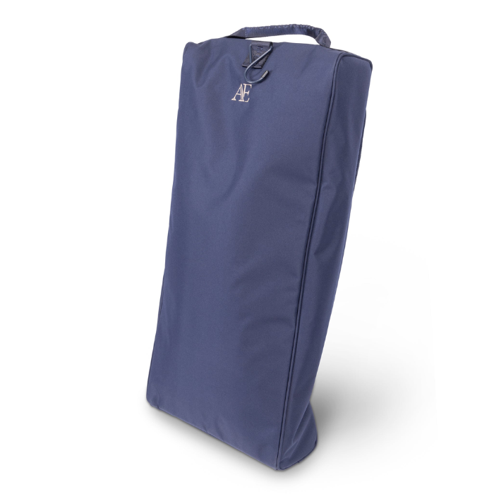 A navy blue padded boot bag with a top carry handle and hook, featuring a silver embroidered 'AE' monogram on the upper front, shown on a white background.