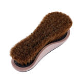 LeMieux AW26 Dandy Brush Varient Navy. A horse grooming brush with brown bristles, a black rubber cushion, and a dusty pink plastic handle, shown on a plain white background.