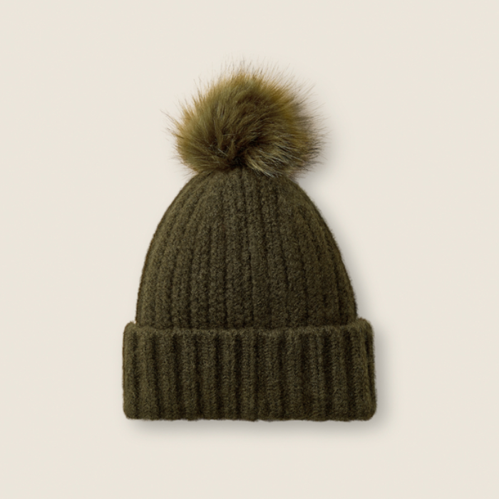Ariat Woman's Chilton Beanie Varient Olive. Olive beanie with a green pom pom on a beige background. 